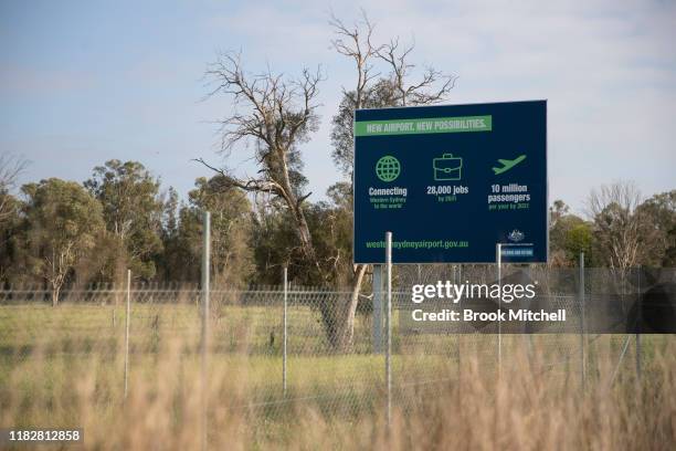 General view of signage at the Badgerys Creek airport site on October 23, 2019 in Sydney, Australia. The Western Sydney airport, located at Badgerys...