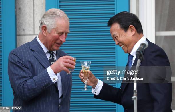 Prince Charles, Prince of Wales and Deputy Prime Minister Taro Aso during a reception to celebrate UK - Japan partnerships, hosted by British...