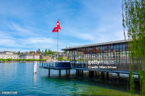 harbor with swiss flag and cityscape - swiss flag stockfoto's en -beelden