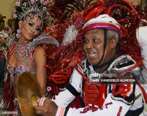 Carol Castro, Queen of the Drums of Academicos do Salgueiro samba school performs ahead of the musicians as their school opens the first night of Rio...