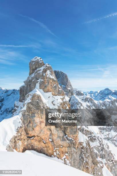 snowcapped mountain range against clear blue sky on a cold winter day. off piste ski route. - mittenwald ski stock pictures, royalty-free photos & images