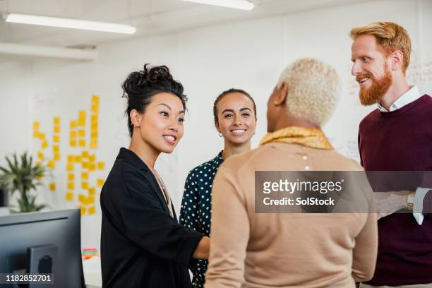 brainstorming as a group - listening stock pictures, royalty-free photos & images