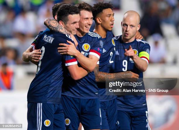 Goalscorer John McGinn, Ryan Jack, Liam Palmer and Steven Naismith celebrate making it 2-1 to Scotland during the UEFA European qualifier between...