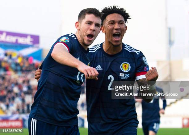 Ryan Christie celebrates with his teammate Liam Palmer after making it 1-0 to Scotland during the UEFA European qualifier between Cyprus and...