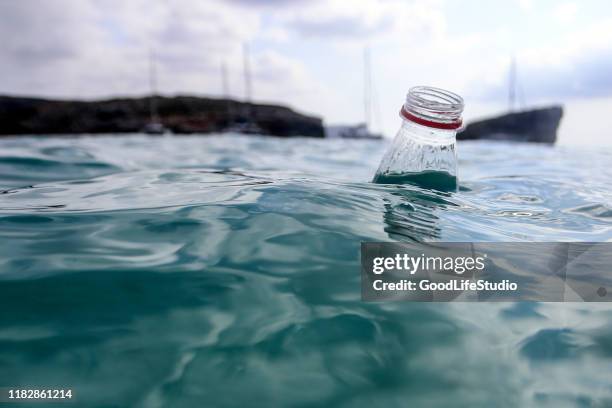 plastic waste - river pollution stock pictures, royalty-free photos & images