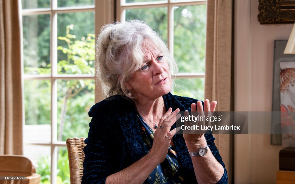 Lady Explaining Something Senior Woman Explaining Something High-Res Stock Photo - Getty Images