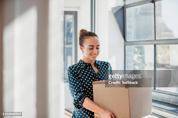unloading new office supplies - carrying boxes stock pictures, royalty-free photos & images