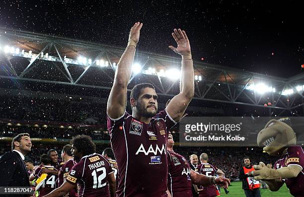 Greg Inglis of the Maroons waves to the crowd as he celebrates winning game three of the ARL State of Origin series between the Queensland Maroons...