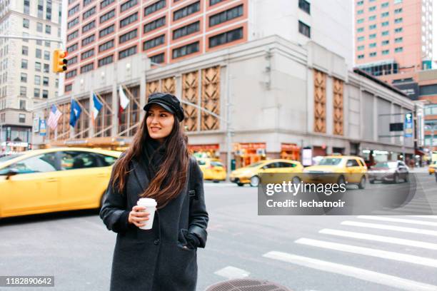 waiting for the ride share in manhattan, ny - taking a vintage ny taxi cab stock pictures, royalty-free photos & images