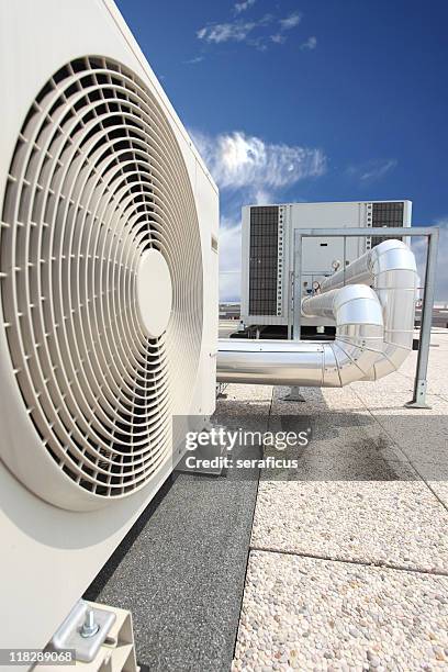 close-up of the white fan of an air conditioning system - industrial fan stock pictures, royalty-free photos & images