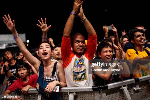 Festival-goers react to a performance by Australian rock band King Gizzard & the Lizard Wizard on day one of the Maho Rasop Festival 2019 on November...
