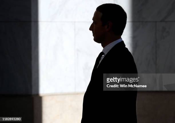 Facebook co-founder and CEO Mark Zuckerberg arrives for testimony before the House Financial Services Committee in the Rayburn House Office Building...
