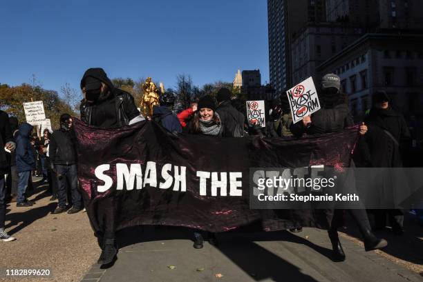 Protesters from various anti-fascist groups rally against the Proud Boys on November 16, 2019 in New York City. Two members of the Proud Boys were...