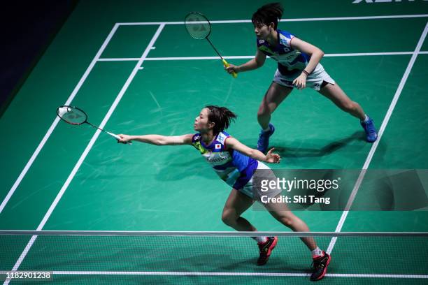 Yuki Fukushima and Sayaka Hirota of Japan compete in the Women's Doubles first round match against Chang Ye Na and Kim Hye Rin of Korea on day two of...