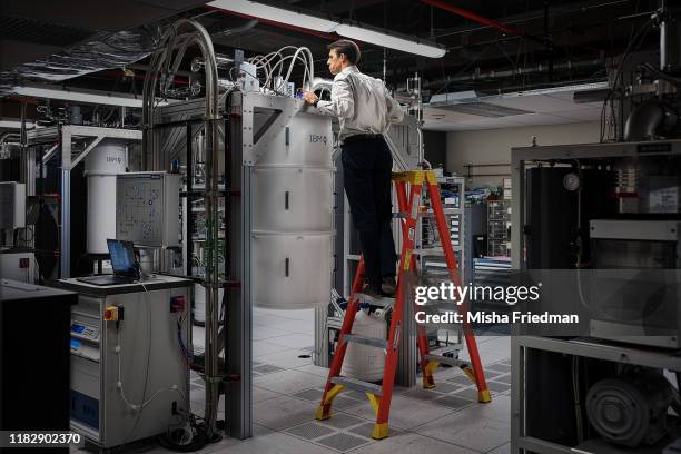 Douglas McClure, Manager, Quantum Engineering, IBM Research, working on IBM Q System One quantum computer on October 18, 2019 at IBM's research...