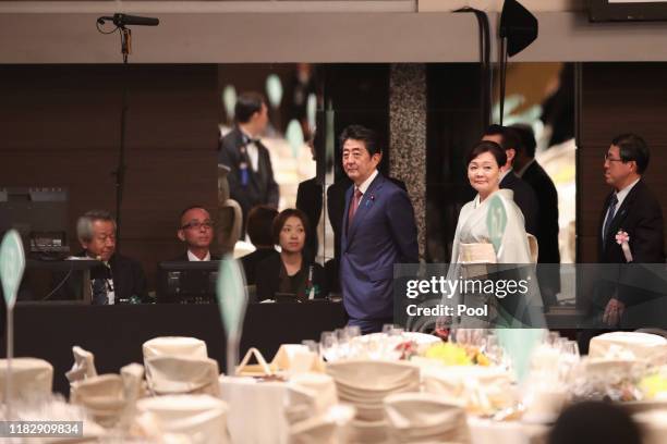 The Prime Minister of Japan Shinzo Abe and his spouse Akie Abe check the preparation situation at the banquet room before the banquet hosted by the...