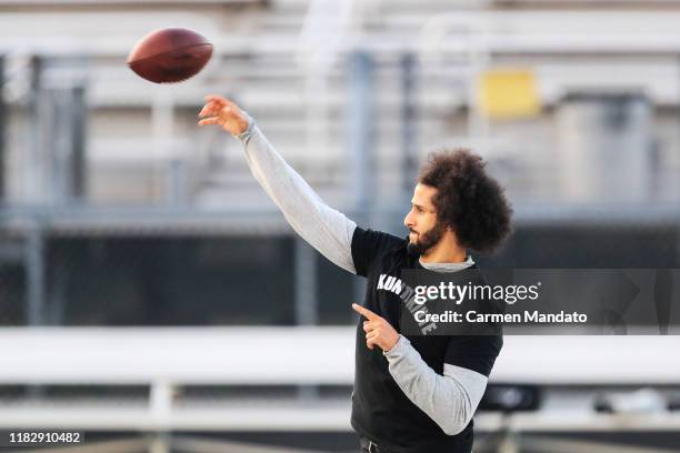 Colin Kaepernick looks to make a pass during a private NFL workout held at Charles R Drew high school on November 16, 2019 in Riverdale, Georgia. Due...