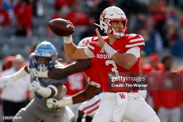 Clayton Tune of the Houston Cougars throws a pass in the first half against the Memphis Tigers at TDECU Stadium on November 16, 2019 in Houston,...