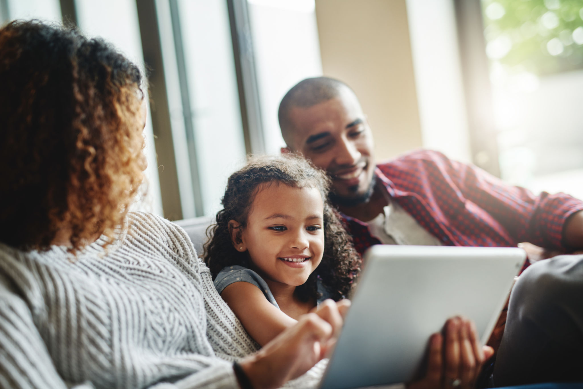 family using technology together