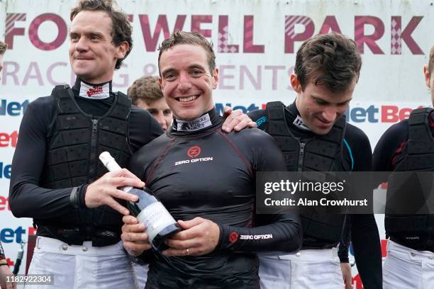 Jockey Andrew Tinkler with his colleagues as he announces his retirement from race riding at Fontwell Park Racecourse on October 23, 2019 in...