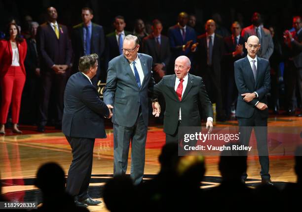 Members of the MLSE Board of Directors Edward Rogers, George Cope, Larry Tanenbaum and NBA Commissioner Adam Silver are introduced during the Toronto...