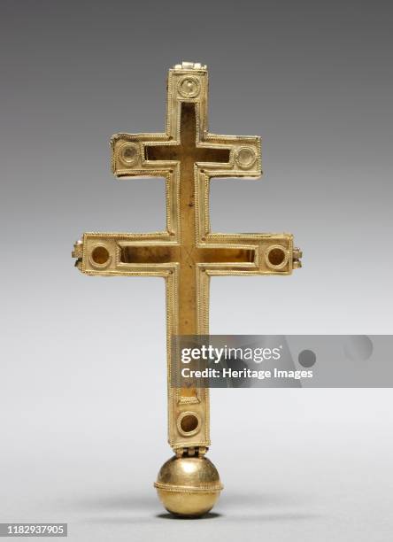 Double-Arm Reliquary Cross, circa 1100-1200. This elegant double-arm cross once contained fragments of four of the most important relics of Christ?s...