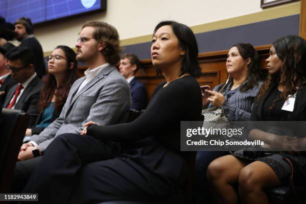 Dr. Priscilla Chan, wife of Facebook co-founder and CEO Mark Zuckerberg, listens to her husband testify before the House Financial Services Committee...