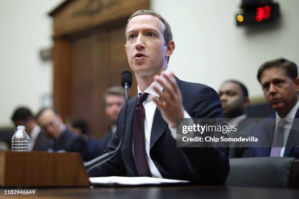 Facebook co-founder and CEO Mark Zuckerberg testifies before the House Financial Services Committee in the Rayburn House Office Building on Capitol...