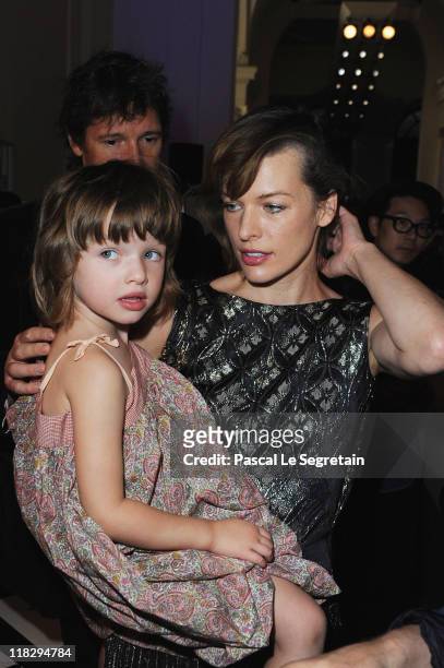 Milla Jovovitch and her daughter Ever Gabo attend the Jean Paul Gaultier Haute Couture Fall/Winter 2011/2012 show as part of Paris Fashion Week on...