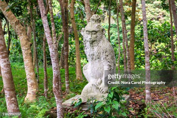 hanuman god statue at monkey forest, bali, indonesia - ubud monkey forest stock pictures, royalty-free photos & images