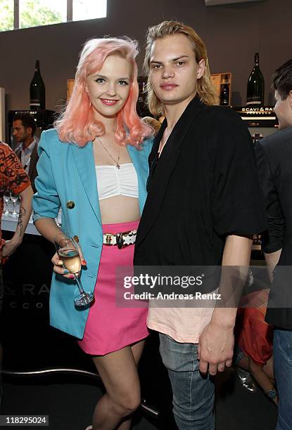 Actor Wilson Gonzalez Ochsenknecht and his girlfiend Bonnie Strange arrive at the Designer for Tomorrow Show during Mercedes-Benz Fashion Week Berlin...