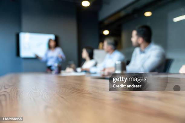 business people in a meeting at the office - business meeting blurry stock pictures, royalty-free photos & images