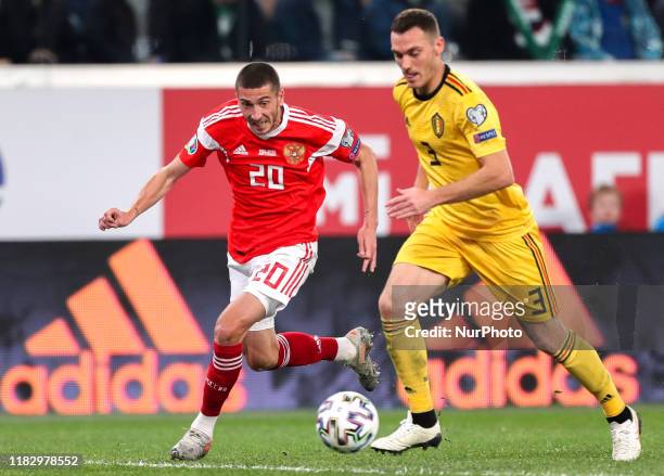 Aleksei Ionov of Russia and Thomas Vermaelen of Belgium vie for the ball during the UEFA Euro 2020 Qualifier between Russia and Belgium on November...