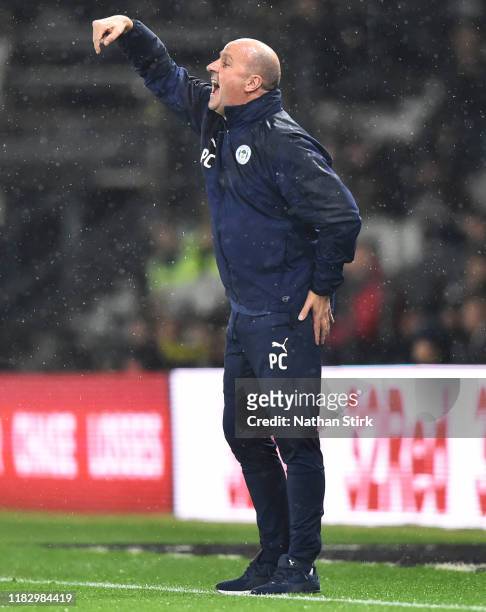 Paul Cook manager of Wigan gestures during the Sky Bet Championship match between Derby County and Wigan Athletic at Pride Park Stadium on October...