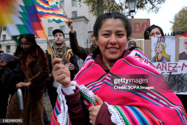 Supporters of President Evo Morales demand a resignation of a self-proclaimed interim president Janine Añez during the demonstration. People gathered...