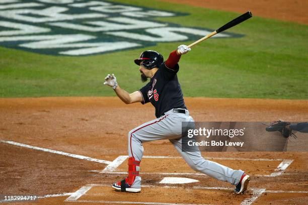 Anthony Rendon of the Washington Nationals hits a two-RBI double against the Houston Astros during the first inning in Game Two of the 2019 World...