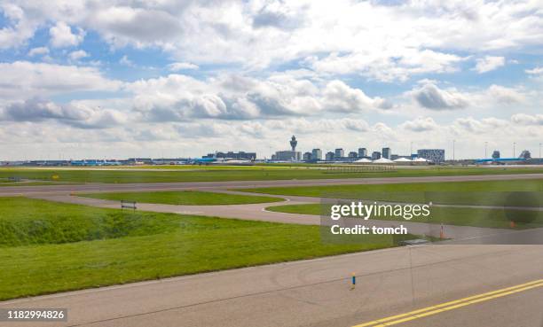 a scene with the amsterdam airport schiphol, the netherlands - amsterdam airport stock pictures, royalty-free photos & images