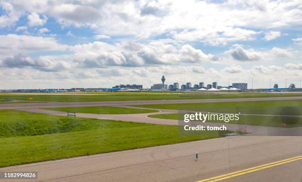 a scene with the amsterdam airport schiphol, the netherlands - schiphol imagens e fotografias de stock