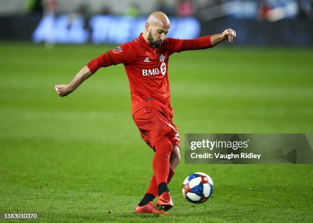 Laurent Ciman of Toronto FC shoots the ball during an MLS First Round Playoff game against D.C. United at BMO Field on October 19, 2019 in Toronto,...