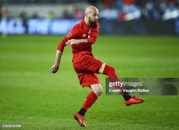 Laurent Ciman of Toronto FC shoots the ball during an MLS First Round Playoff game against D.C. United at BMO Field on October 19, 2019 in Toronto,...