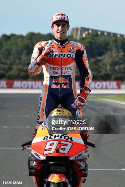 MotoGP world champion Repsol Honda Team's Spanish rider Marc Marquez poses prior to the MotoGP race of the Valencia Grand Prix at the Ricardo Tormo...
