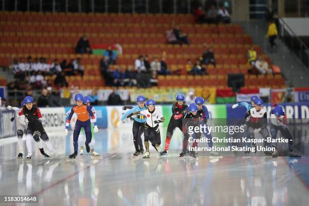 Skaters stand for the start of Women`s Mass start semi-final 1 during the ISU World Cup Speed Skating at Minsk Arena on November 17, 2019 in Minsk,...