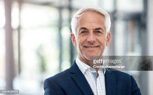 confidence and success go hand in hand - mature men stock pictures, royalty-free photos & images