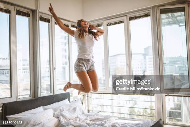 waking up routine - bed sun stock pictures, royalty-free photos & images