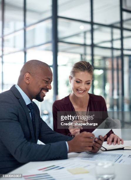 teamwork gets more done - 2 people smiling stock pictures, royalty-free photos & images