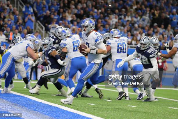 Jeff Driskel of the Detroit Lions runs the ball for a touchdown in the second quarter against the Dallas Cowboysat Ford Field on November 17, 2019 in...