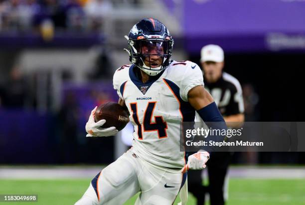 Courtland Sutton of the Denver Broncos runs with the ball the ball in the first quarter of the game against the Minnesota Vikings at U.S. Bank...