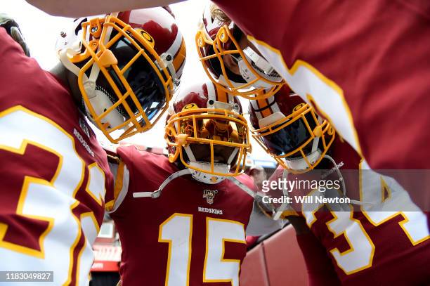 Steven Sims of the Washington Redskins huddles with teammates prior to the game against the New York Jets at FedExField on November 17, 2019 in...