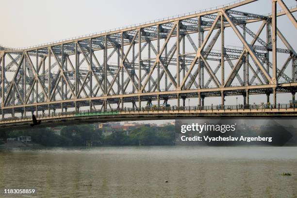 the howrah bridge, kolkata, india - howrah bridge stock pictures, royalty-free photos & images