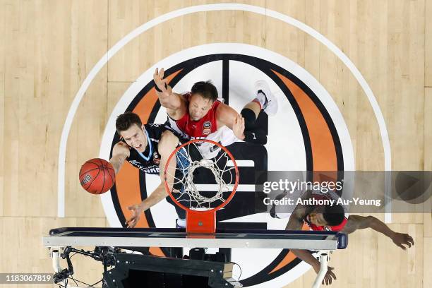 Tom Abercrombie of the Breakers goes up against David Anderson of the Hawks during the round four NBL match between the New Zealand Breakers and the...